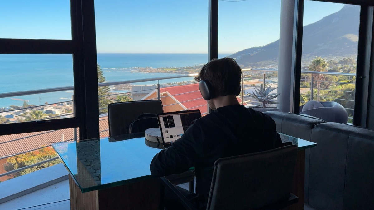 Logan working from an apartment above Cape Town